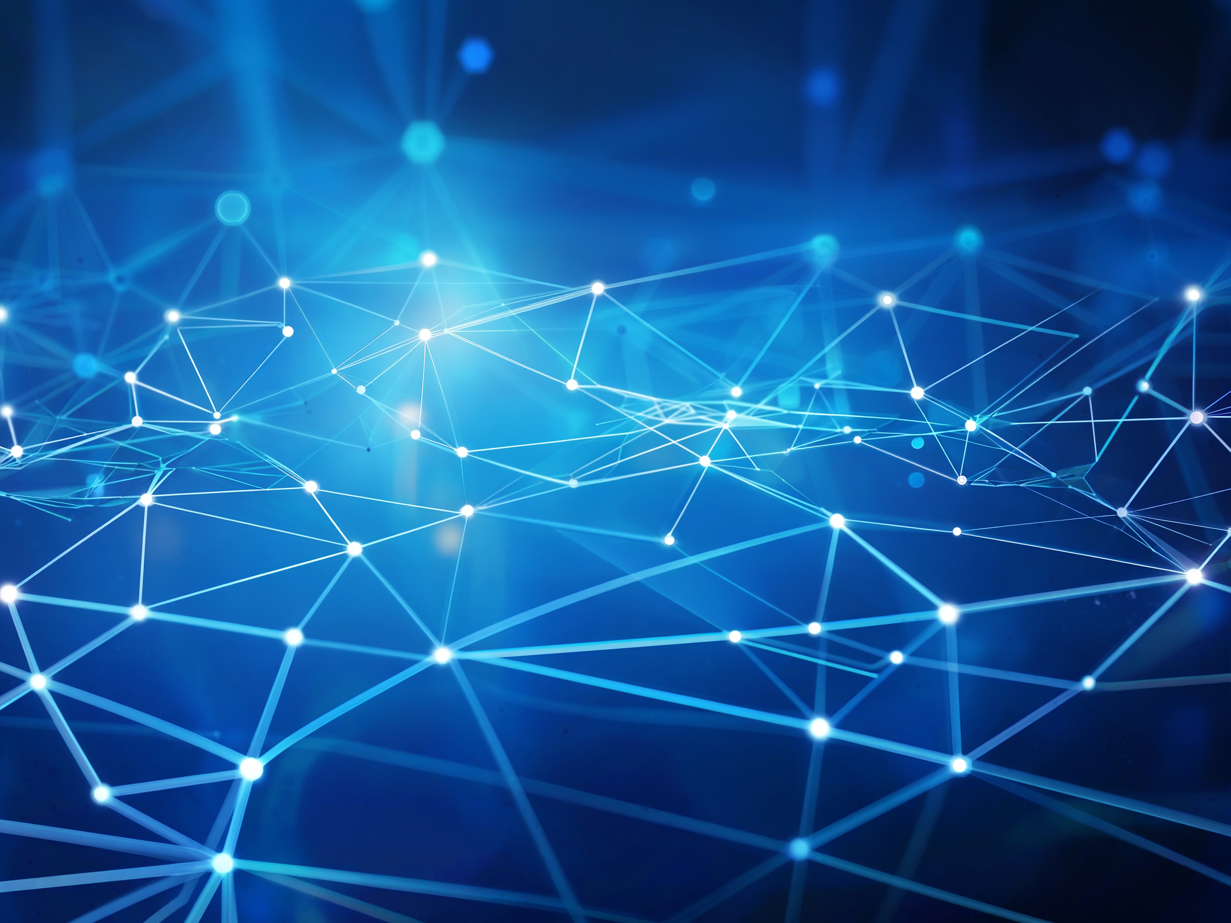 Abstract network of glowing blue connected nodes